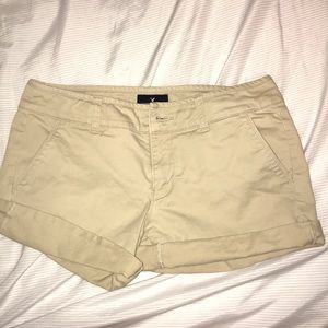 AMERICAN EAGLE KHAKI MIDI STRETCH SHORTS